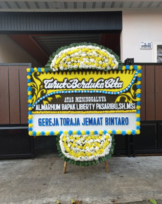 Papan Bunga Duka di Dullah