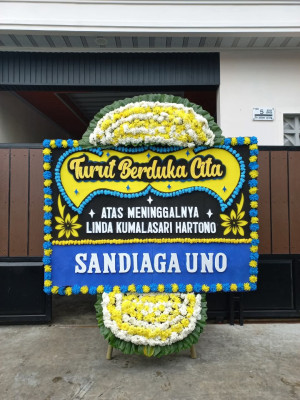 Papan Bunga Duka di Dullah